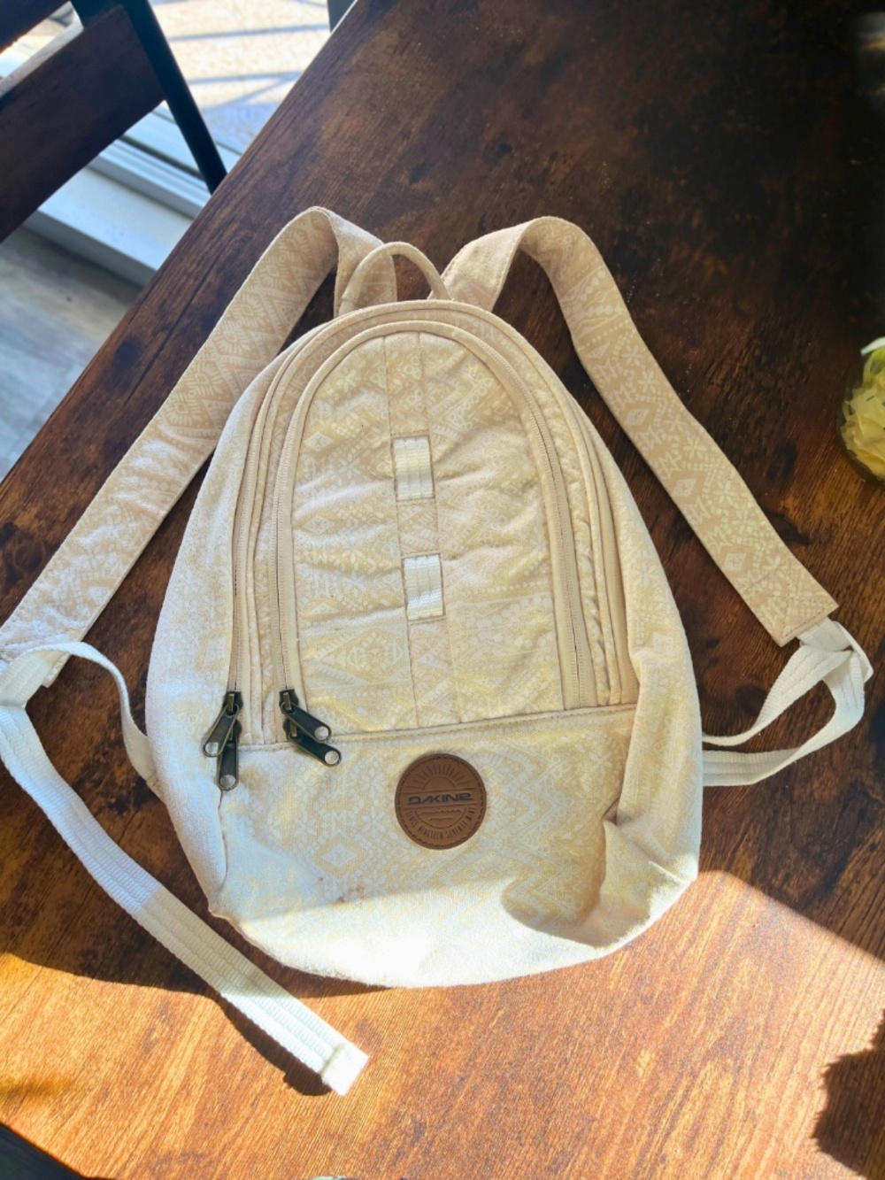 Dakine backpack in a beautiful cream/beige geometric print